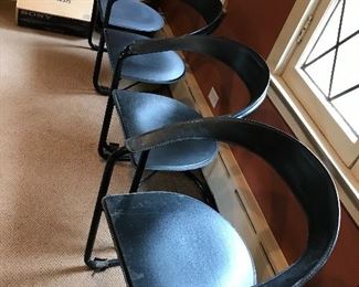 Four Sharp leather arms