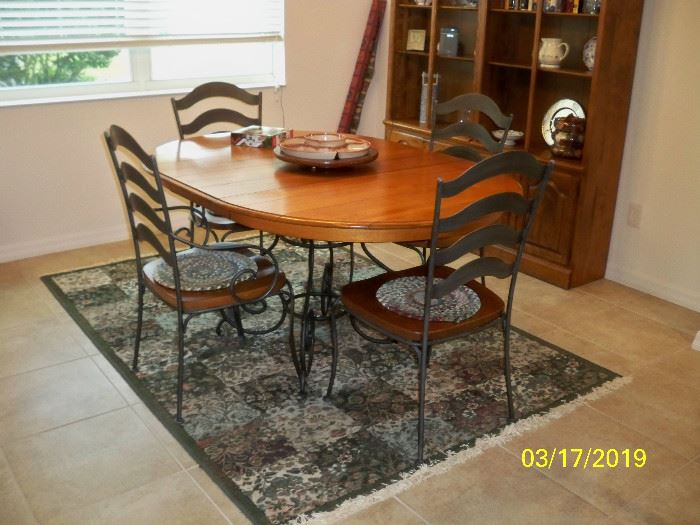 Wood and Metal Dining table with 4 chairs and 1 leaf; 5' x7' Area rug #1