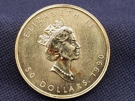12 1990 $50 Maple Leaf 1oz. Fine Gold Coin 1990 $50 Maple Leaf 1oz. Fine Gold Coin