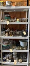 # 267 Five shelves of miscellaneous glassware and silverware Five shelves of miscellaneous glassware and silverware