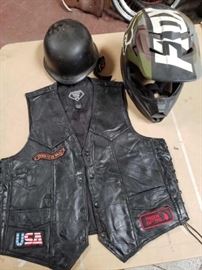 # 280 Fox Helmet Size M, Small Helmet, and Leather Vest with Patches Fox Helmet Size M, Small Helmet, and Leather Vest with Patches
