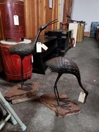 # 700 2 Metal Birds on a Natural Stone Base Tallest Bird Measures 24 inches tallS