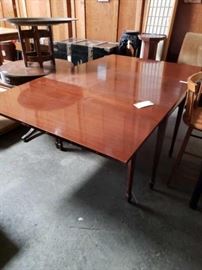 #727: Table with Fold Down Sides
Measure 71" long with the sides up and 23" with the sides down 44" deep 29" tall