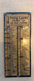 Original Grocery Reminder with all the original metal tabs. This is ATTACHED to the HYGENA Hoosier Cabinet and will not be sold separately  