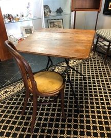 Vintage Desk with Metal Legs (table folds up for easy storage) and an antique wooden parlor chair
