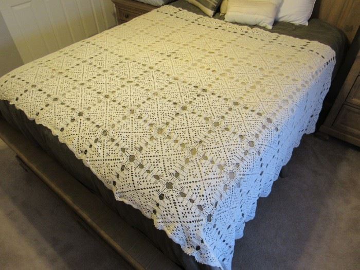 There is more than one hand crochet bedspreads - very nice condition.