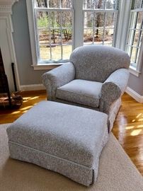 Overstuffed armchair and ottoman