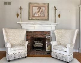 All furnishings are in excellent condition! Here is a pair of wingback chairs with fringed accent.
