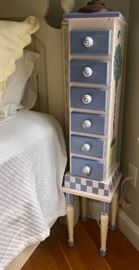Tall chest of small drawers