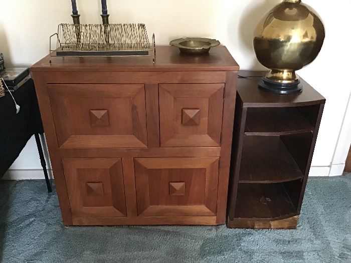 Nice cabinet with four compartments, round , brass lamp , record holder, brass candle holders