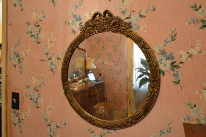 Ornate round mirror