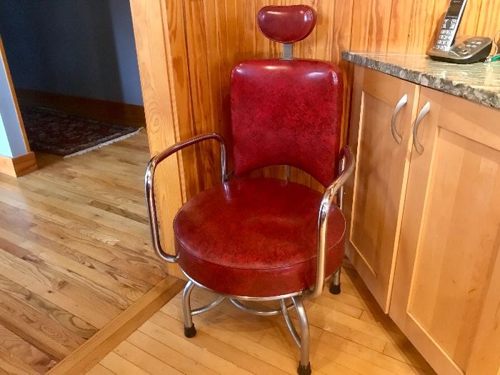 Vintage chrome chair on wheels