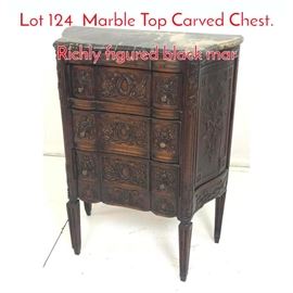 Lot 124 Marble Top Carved Chest. Richly figured black mar