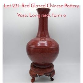 Lot 231 Red Glazed Chinese Pottery Vase. Long neck form o