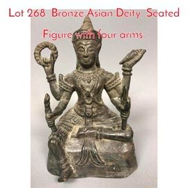 Lot 268 Bronze Asian Deity. Seated Figure with four arms.