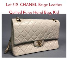 Lot 312 CHANEL Beige Leather Quilted Purse Hand Bag. Kid 