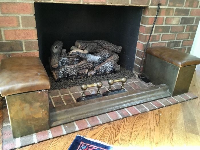 Antique brass fireplace fender with leather top tinder boxes