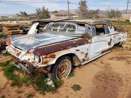 #22: 1960 Ford Thunderbird Coupe
Has chrome front and rear bumpers, also has the rear glass inside the car. VIN: 0Y71Y134081