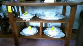 Porcelain platters and casserole dishes with lids.