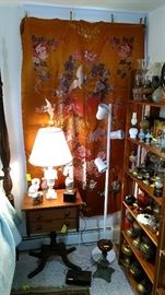 Asian silk tapestry, mahogany pedestal side table, marble lamp