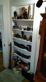 Wonderful collection of military, carved figurines, sport cars, rifle cleaning rods, etc.