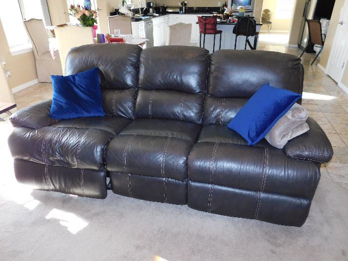 Reclining sofa in dark brown