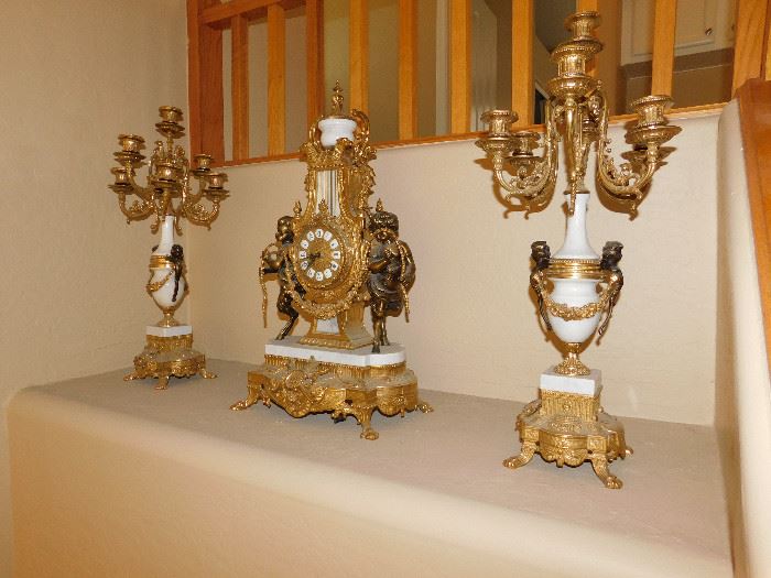 Franz Hermle Empire Imperial clock with matching candlesticks.