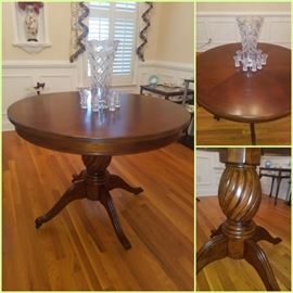 Round cherry table with carved spiral base