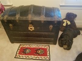 Antique black humpback steamer trunk