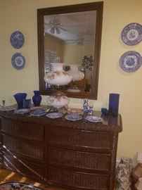 Wicker dresser (cut glass top), large mirror, blue/white collectible plates (Spode) & other blue/white glass.