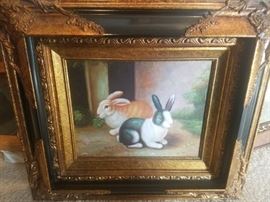 Framed rabbits art work. 