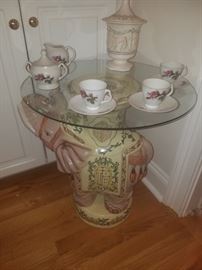 Ceramic pink elephant table with round glass top, tea set, & ceramic covered compote