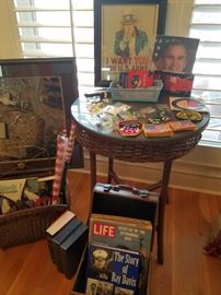 Wicker round table with glass top, Signed Story of Ray Davis, "I Want You for U.S. Army" framed poster, military pins and other American collectibles.