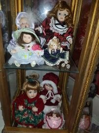 Dolls inside display case (Vitrine Italy)