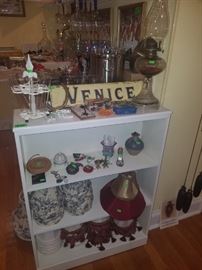 Oil lamp. Lamp shades. Small bookshelf and miscellaneous decor 