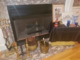 Brass fire dogs, brass fireplace tool set, brass bucket, copper and blue coal bucket, framed art, and more