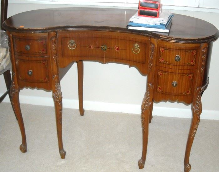 Kidney shaped desk in the french style.