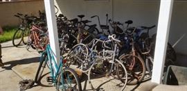 A bicycle collection of all shapes and sizes...most need some work.