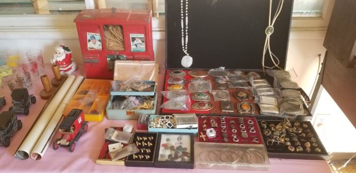 Nice assortment of decorative,  sterling and other rings and jewelry. 