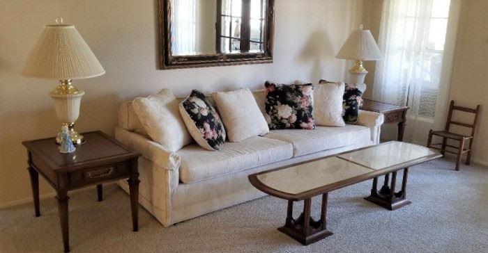 Beautiful white cramy sofa, end tables, lamps and unique cofee table for sale.
