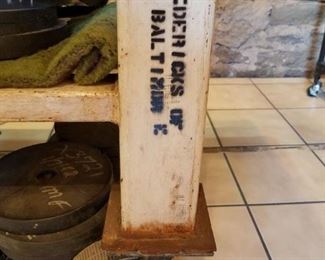 antique metal cart, with glass top, metal wheels, VERY heavy, stamped Fredericks of Baltimore