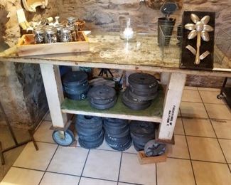 antique metal cart, with glass top, metal wheels, VERY heavy, stamped Fredericks of Baltimore. Was used to clean/wash parts in auto repair shop