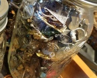 jars of loose, assorted jewelry pieces