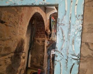 tin ceiling floor mirror detail