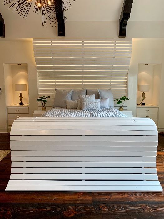 Impressive custom designed, one of a kind bed by Goebel Furniture. TV raises from insdie the footboard. 