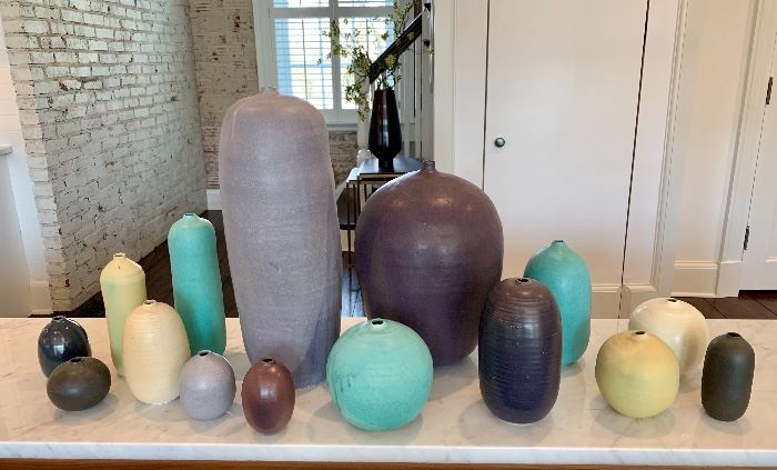 Large collection of Judy Jacskson Stoneware bottles and vases