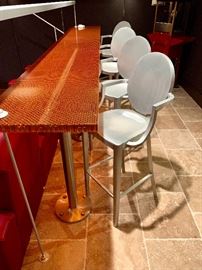 Set of four bar height Kong by Philippe Starck bar stools