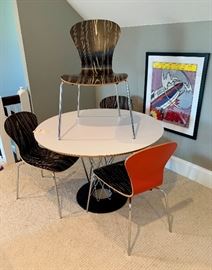 Noguchi for Knoll 42" Cyclone Dining Table with a set of four Sprite Stacking Chairs