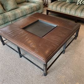 Baker leather cocktail ottoman with iron base measures 52" square x 16"H 