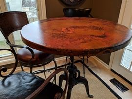 $750  Arhaus copper hammered adjustable, 38 inch round. SOLD